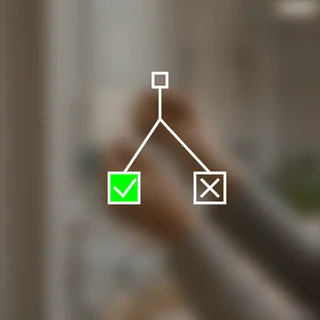 A decision tree branching to a green check mark and a white cross.