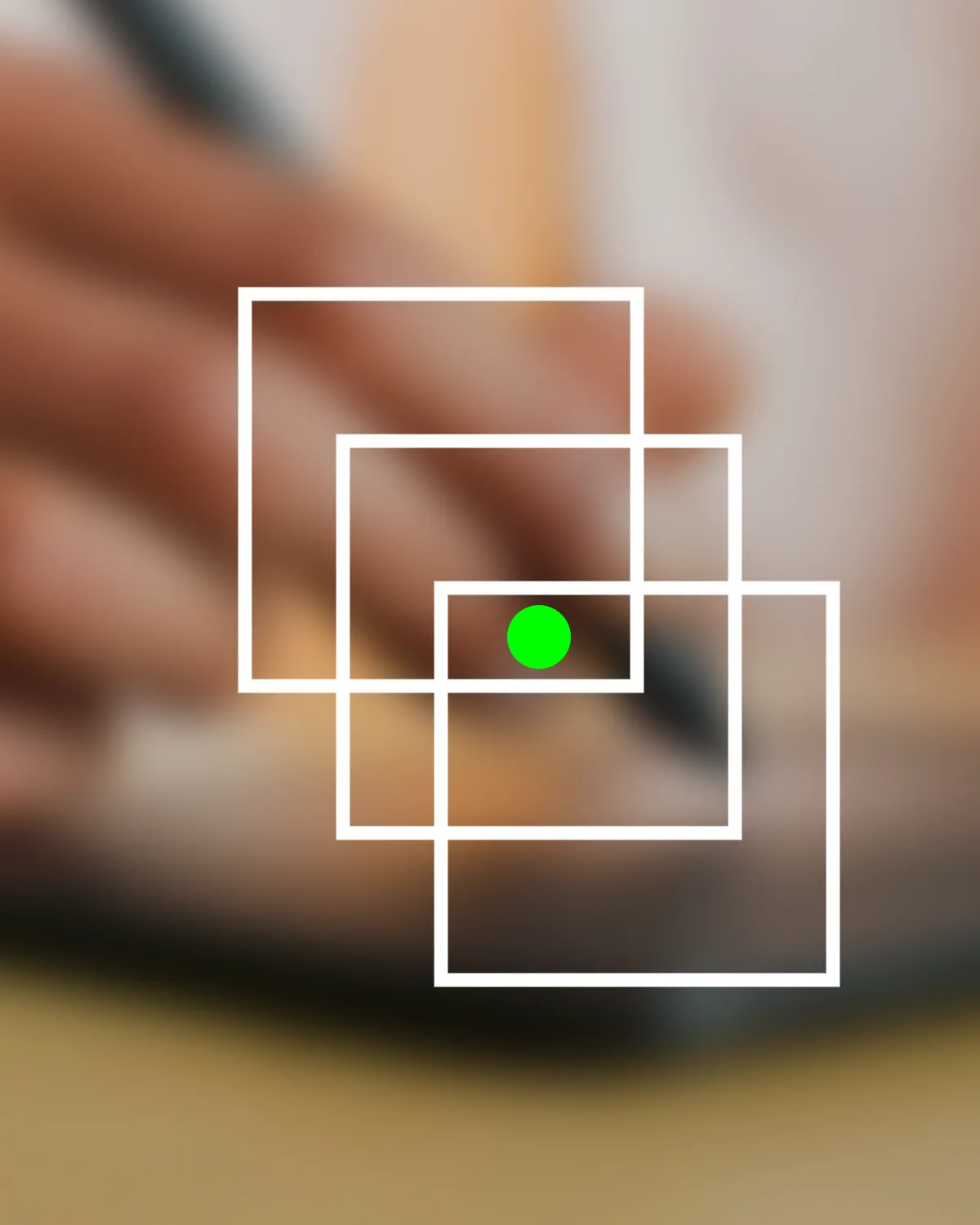 Three overlapping white frames over a blurred background, with a green dot in their shared area.